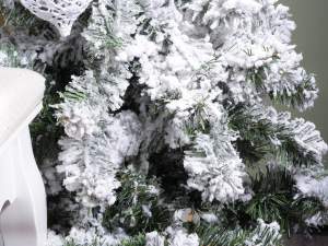 Artificial snow covered pines