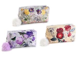 Floral faux leather beauty case with pompon and zip