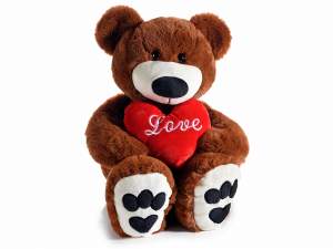 Ursuleț cu inimă umplută și scris „Dragoste”.
