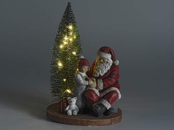 Árbol de Navidad con Papá Noel y niño en resina y luces LED