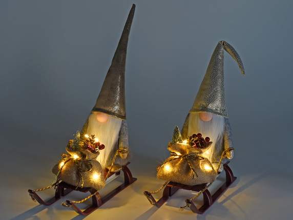 Papá Noel en tela suave en trineo con regalos y luces LED