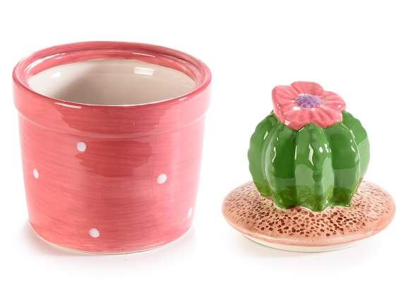 Tarro de cerámica con tapa de cactus.