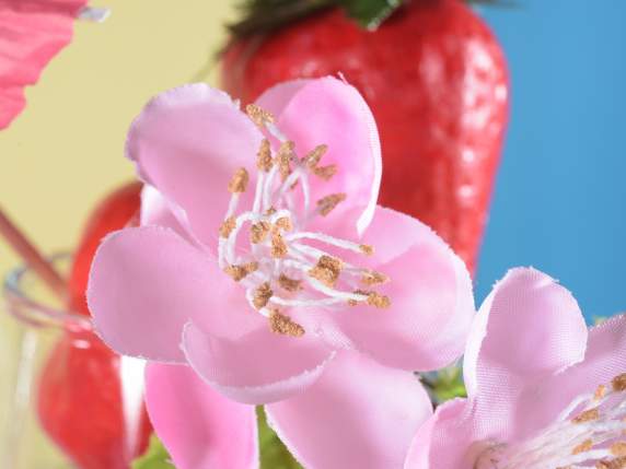 Artificial bouquet of peach blossoms with leaves