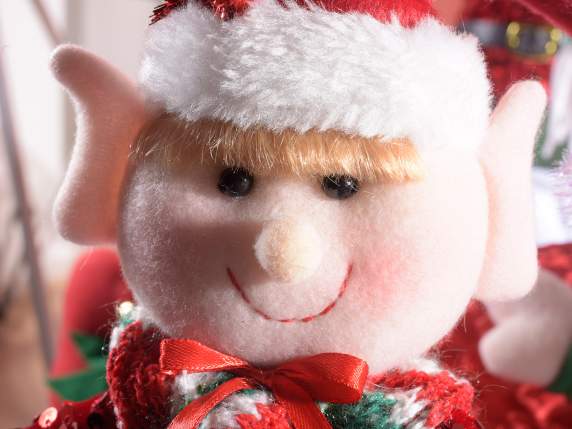 Elfo natalizio con abito in paillettes su palla in stoffa