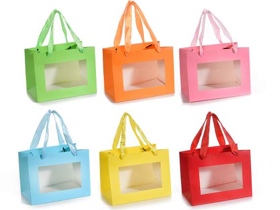 Petit sac en papier coloré avec poignées en tissu et fenêtre