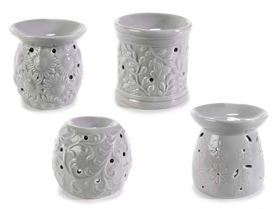 Esencias ardientes en cerámica gris con decoraciones en reli