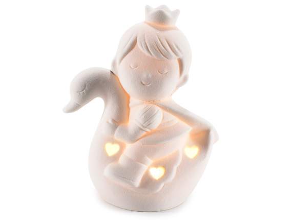 Prinz auf Porzellanschwan mit Herzen und LED-Lichtern