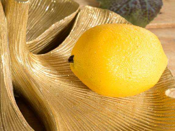 Künstliche dekorative gelbe Zitrone