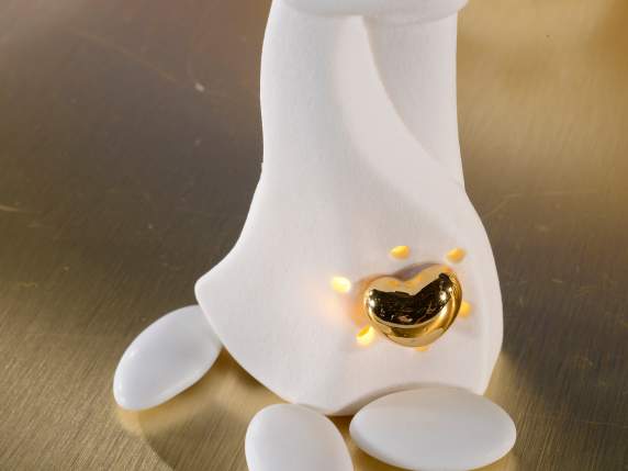 Liebespaar aus Porzellan mit goldenem Herz und LED-Lichtern