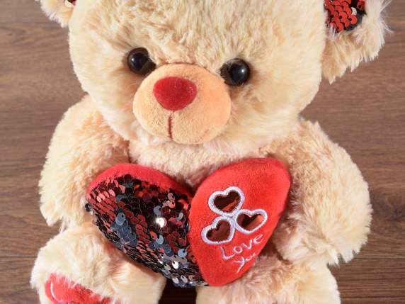 Teddybär mit Herz und wendbaren Paillettenohren