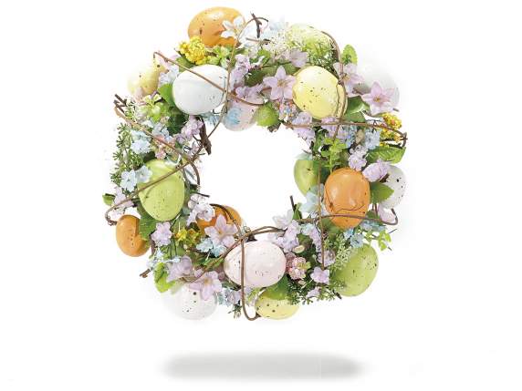 Guirnalda con huevos de colores y flores de durazno