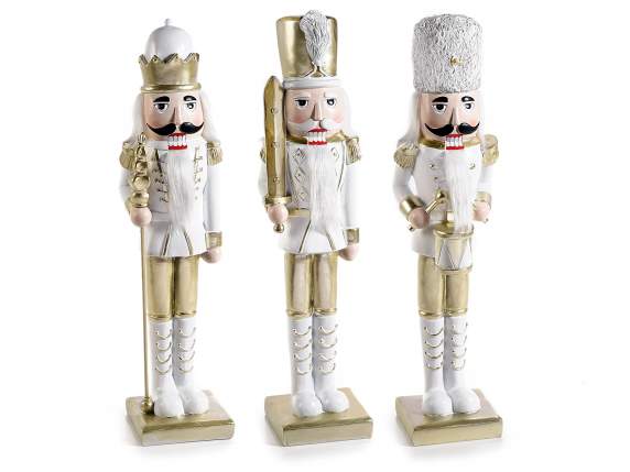 Nutcracker in white and golden resin to be placed on