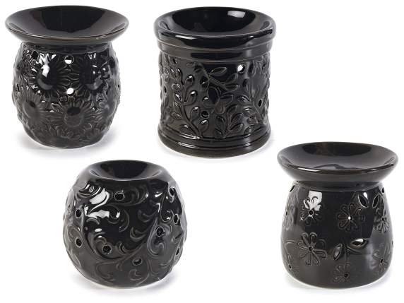 Esencias de quemaduras en cerámica negra con decoraciones en