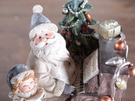 Rotierende Spieluhr mit Weihnachtsmann und Kind aus Harz