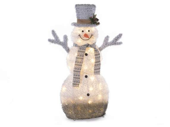Schneemann aus schneebedecktem Stoff mit warmweißen LED-Lich