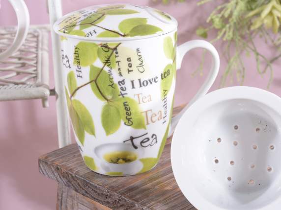 Taza de té de hierbas de porcelana con filtro en caja de reg