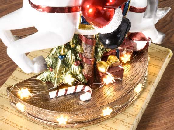 Spieluhr Weihnachtsmann aus Harz auf Pferd mit Lichtern und