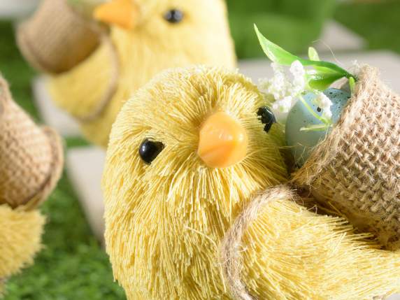 Natural fiber chick with egg in the basket to place