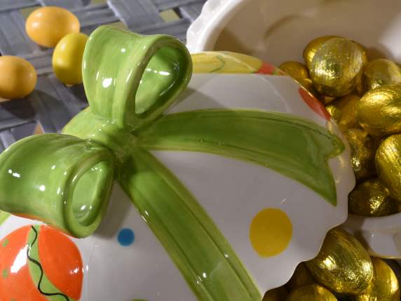 Painted ceramic egg-shaped candy jar with bow