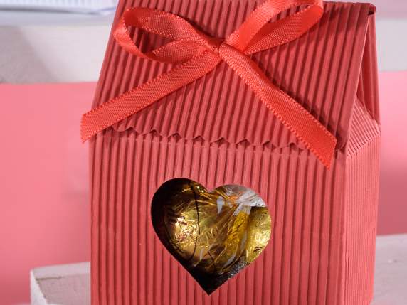 Corrugated cardboard box with heart window and bow