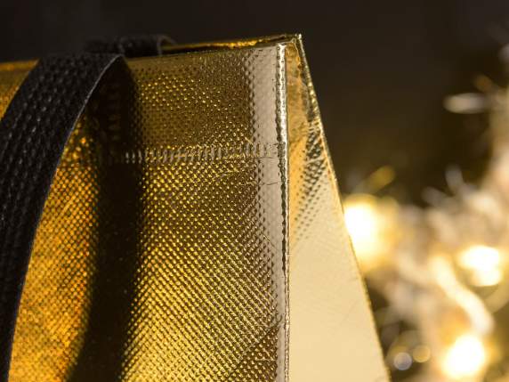 Small bag in gold metallic non-woven fabric