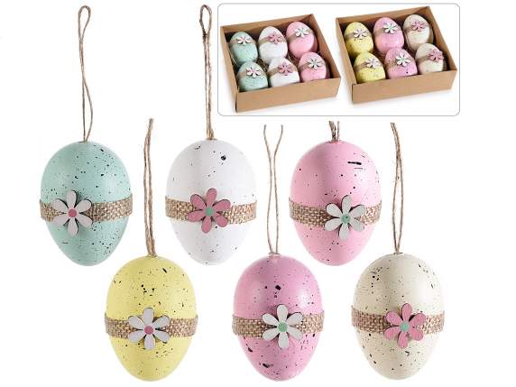 I display 6 colored plastic eggs with wooden flowers to hang