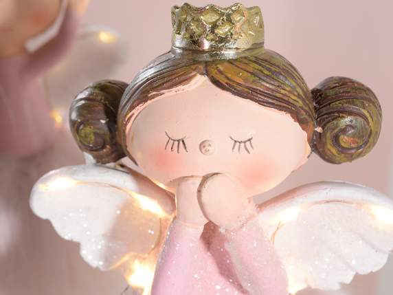 Resin angel with eco-fur skirt and wings with LED light