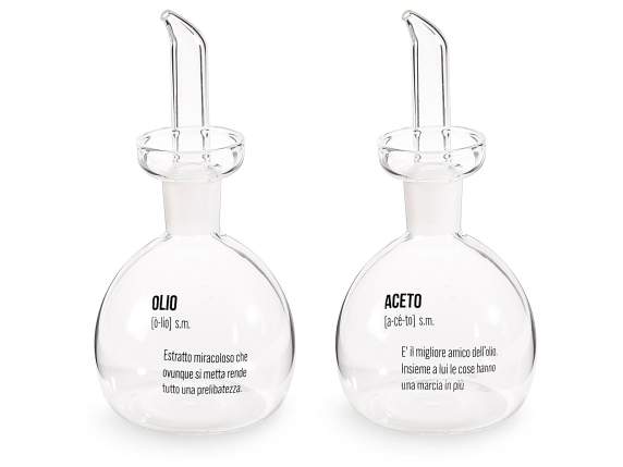 Glass oil-vinegar cruet with measuring cap Dictionary