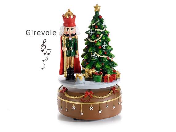Revolving music box with nutcracker music and resin tree