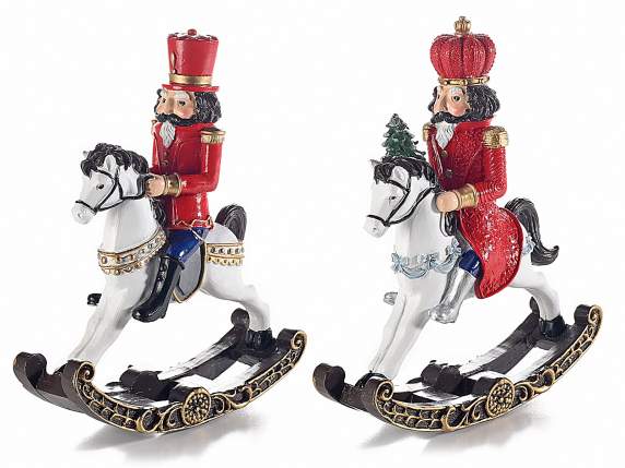 Resin decoration with nutcracker on rocking horse