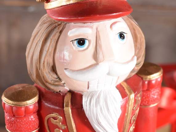 Nutcracker soldier in decorated resin to be placed