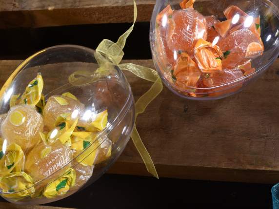 Clear plastic egg openable with hanging ribbon