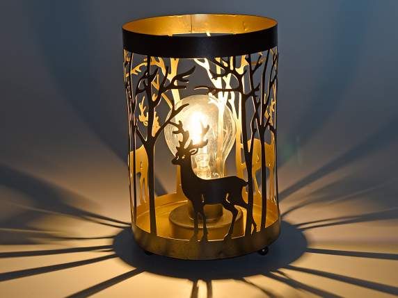 Metal lamp with landscape and reindeer and golden interior