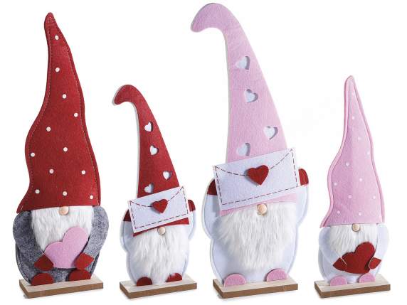 Set of 2 cloth gnomes with heart decorations on a wooden bas