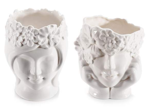 Face vase with wreath of flowers in glossy white porcelain