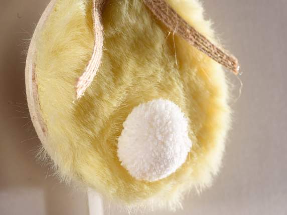 Bunny made of wood and soft fur to hang