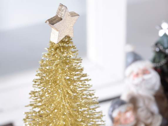 Golden artificial Christmas tree with star