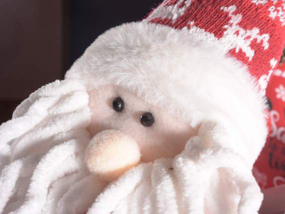 Chiffon de Noël - personnage en tricot avec bonnet