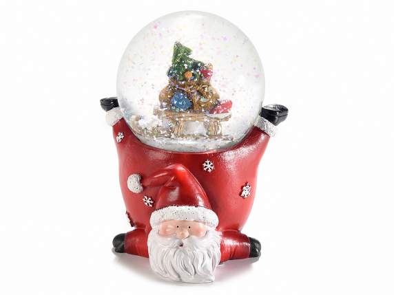 Bola de nieve con personaje navideño sobre base de resina