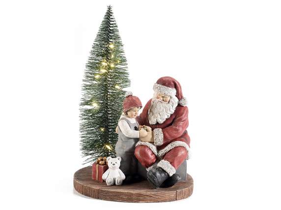 Sapin de Noël avec Père Noël et enfant en résine et lumières