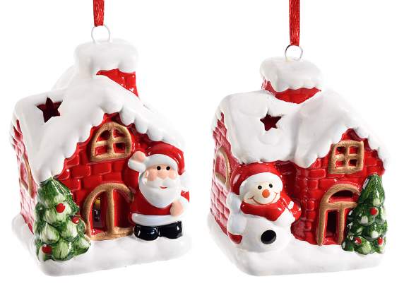 Maison en céramique avec personnages de Noël avec lumières à