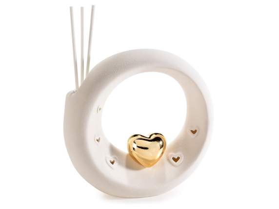 Cercle en porcelaine avec coeur doré, lumières et bâton de p