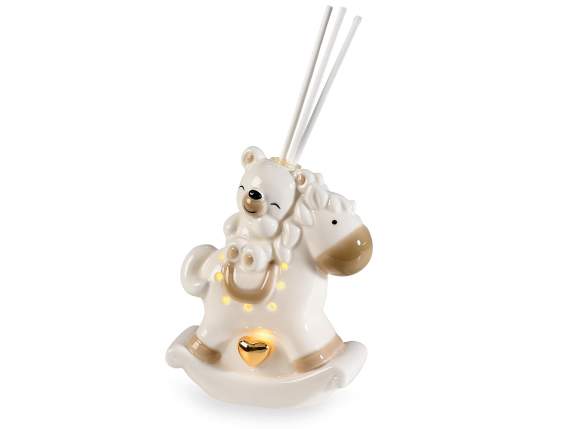 Porcelain bear on rocking horse w-lights, perfume stick