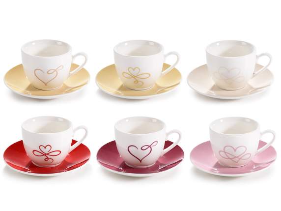 Ceramic coffee cup with heart and colored saucer