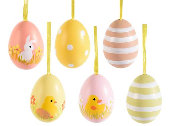 I display 12 hand-painted plastic eggs to hang