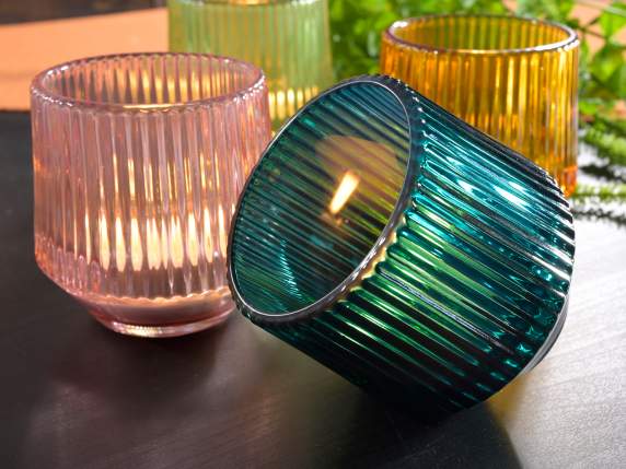 Tealight candle holder in knurled glass with curved base