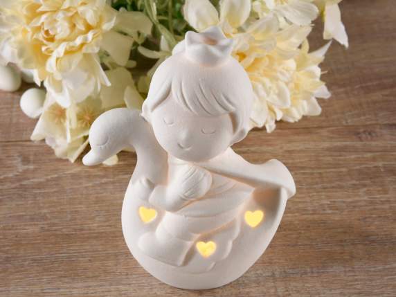 Prince on porcelain swan with hearts and LED lights