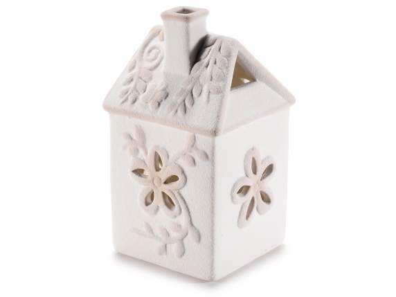 Porcelain house with embossed flower details and LED lights