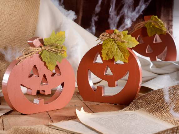 Set of 3 carved wooden pumpkins with leaf and bow