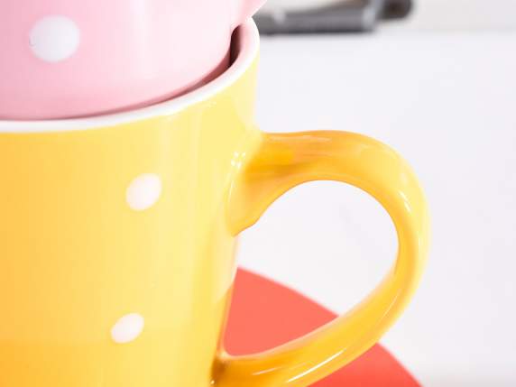 Colorful porcelain mug with polka dot decoration